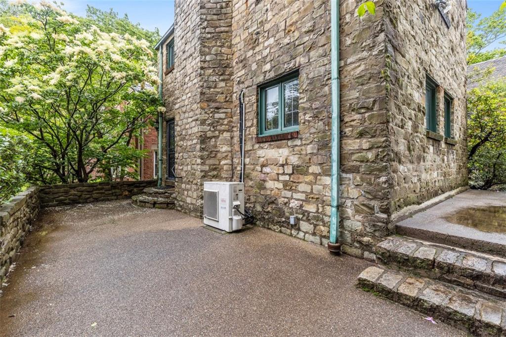 1 Robin Road Pittsburgh, PA 15217 - Photo 42 of 48 a view of a brick house with a street