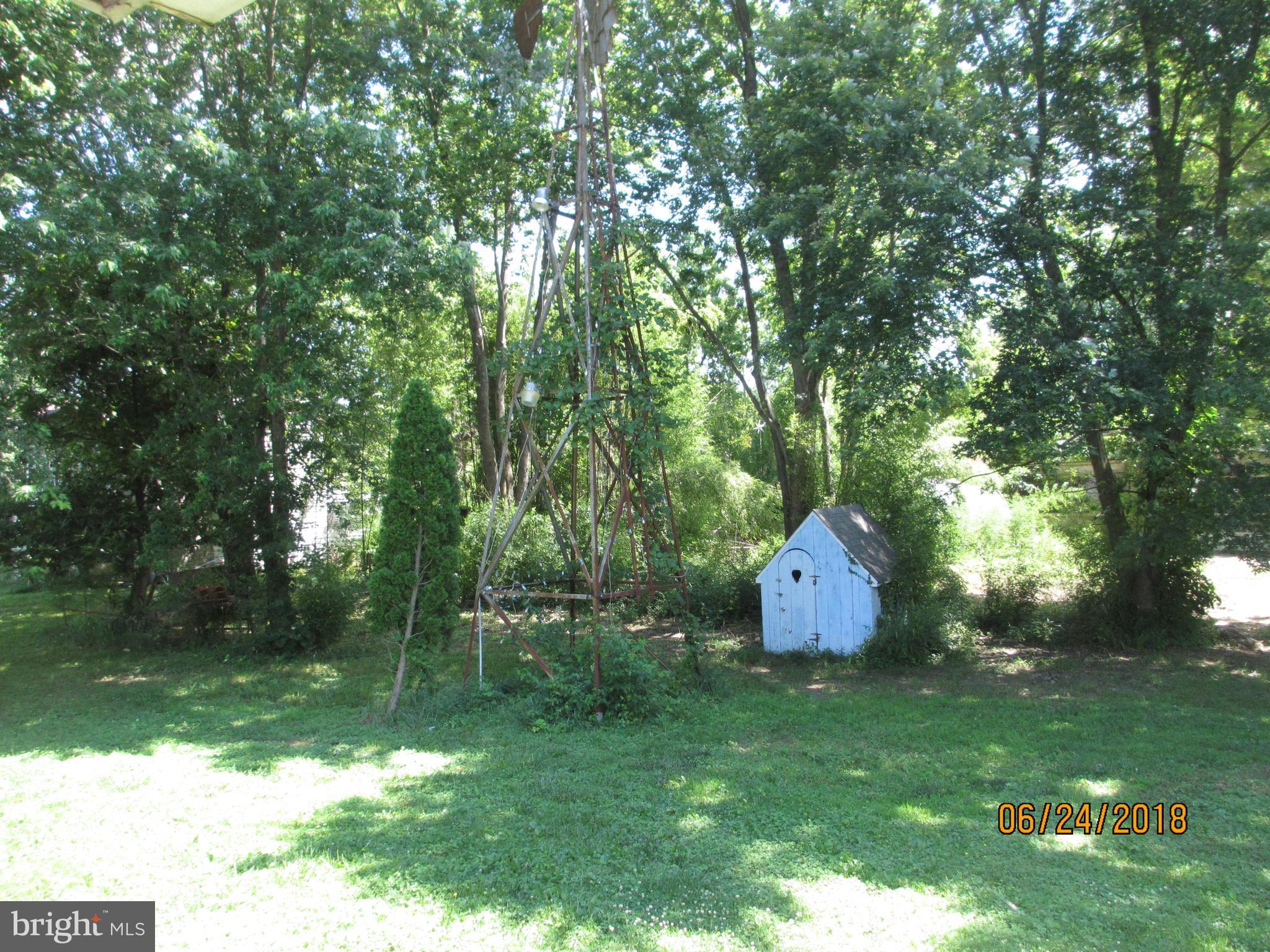 5732 Allender Road White Marsh, MD 21162 - Photo 14 of 15 a garden view with a fountain