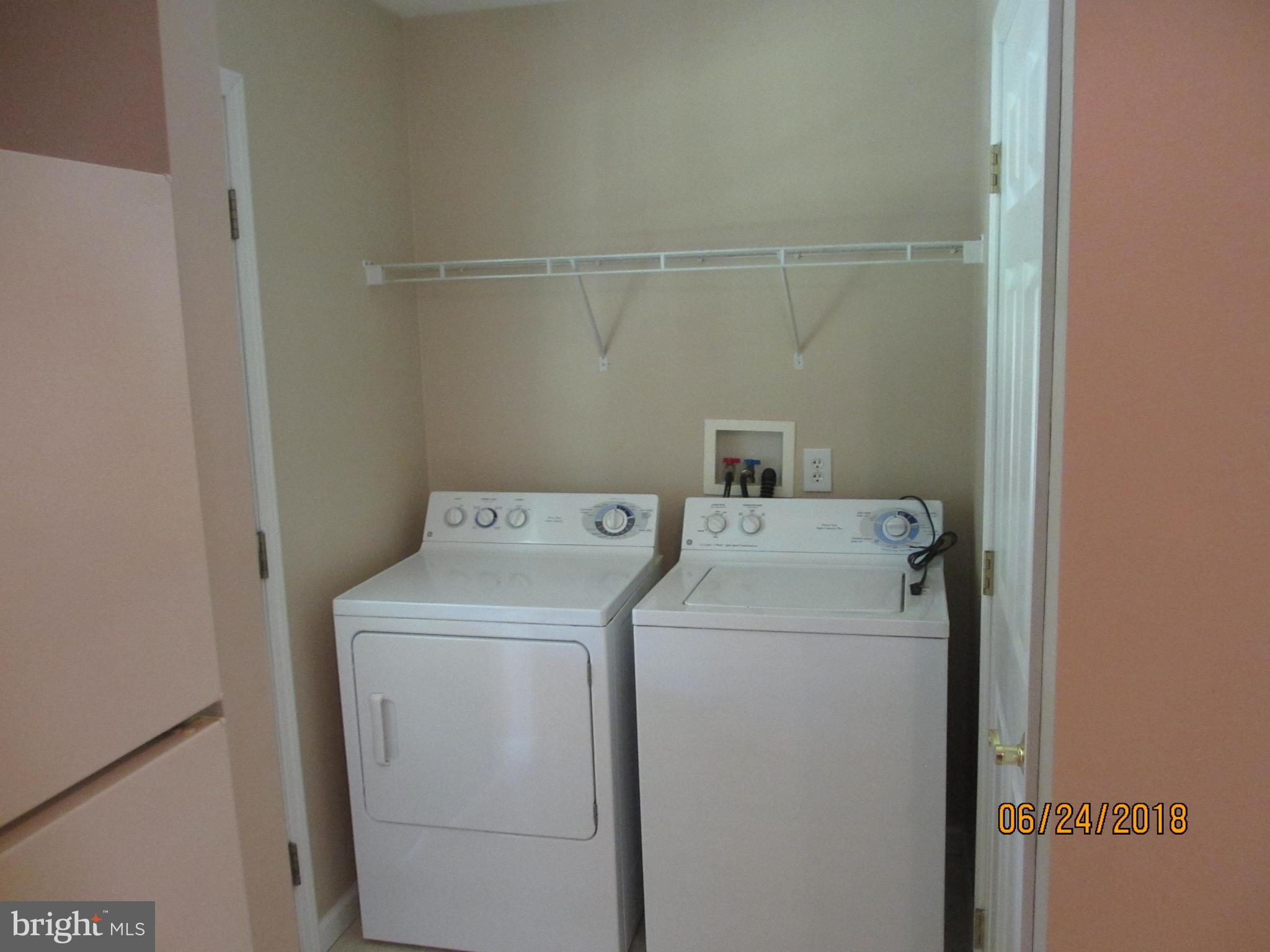 5732 Allender Road White Marsh, MD 21162 - Photo 5 of 15 a utility room with dryer and washer