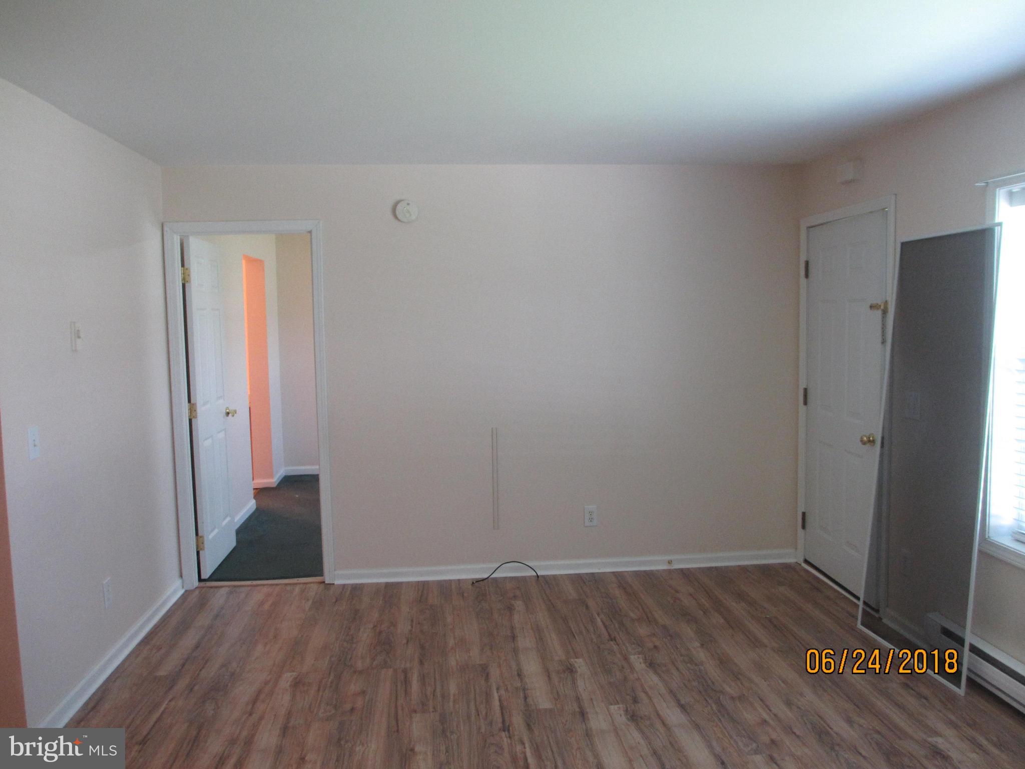 5732 Allender Road White Marsh, MD 21162 - Photo 7 of 15 wooden floor in an empty room