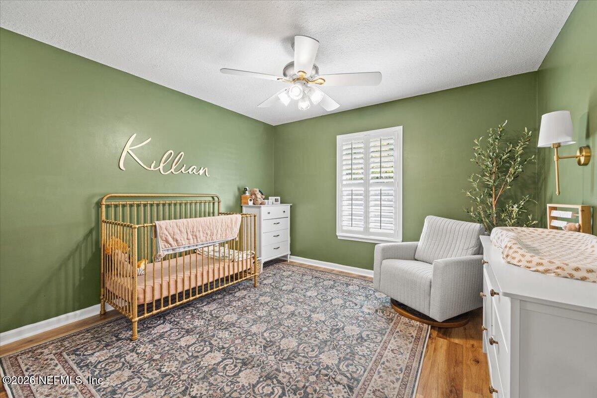 54130 Church Road Callahan, FL 32011 - Photo 29 of 42 a bedroom with a bed and a window