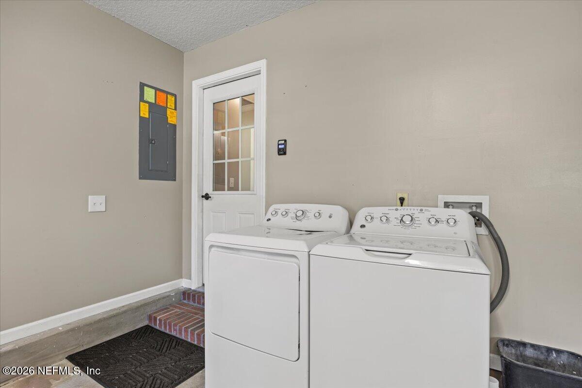 54130 Church Road Callahan, FL 32011 - Photo 35 of 42 a utility room with dryer and washer