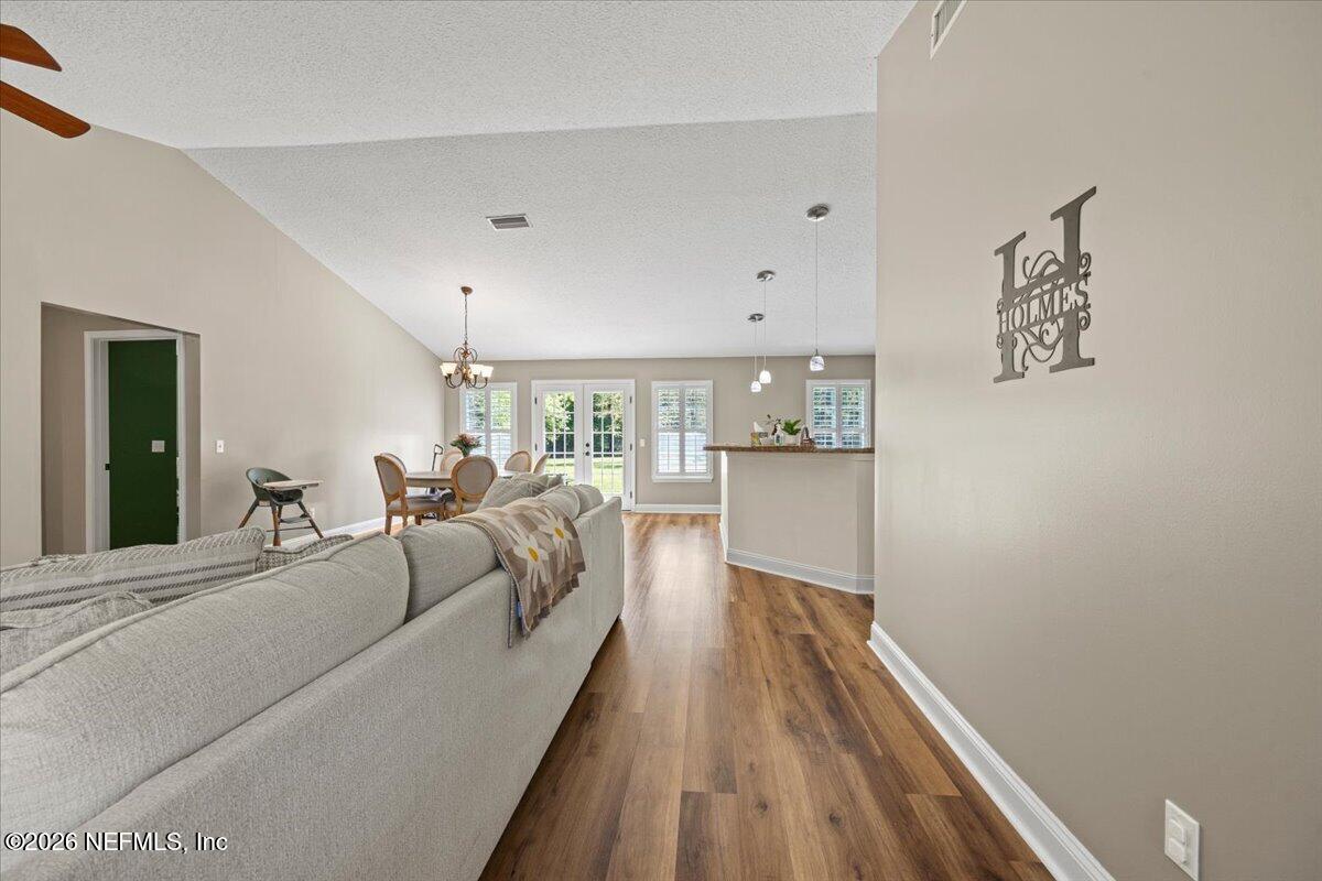54130 Church Road Callahan, FL 32011 - Photo 6 of 42 a living room with furniture and a wooden floor