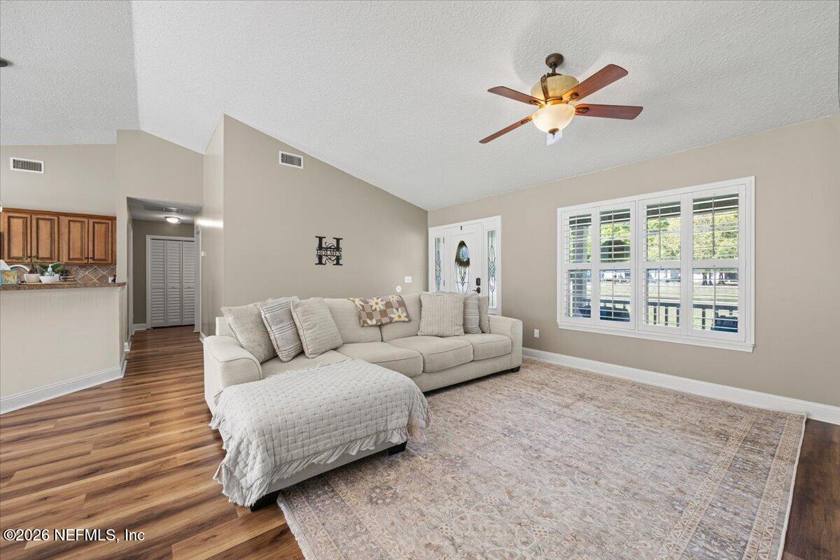 54130 Church Road Callahan, FL 32011 - Photo 9 of 42 a living room with furniture and a large window