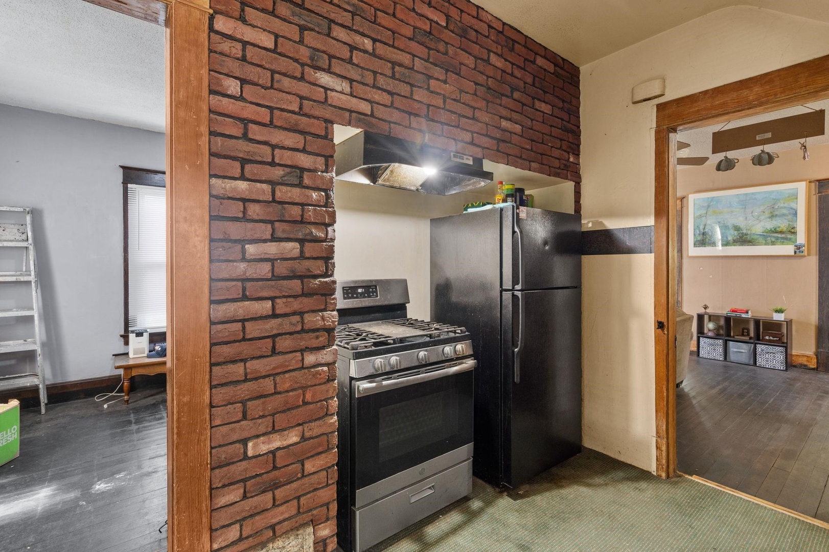 1721 28th Street Rock Island, IL 61201 - Photo 11 of 27 a kitchen with a refrigerator and a stove