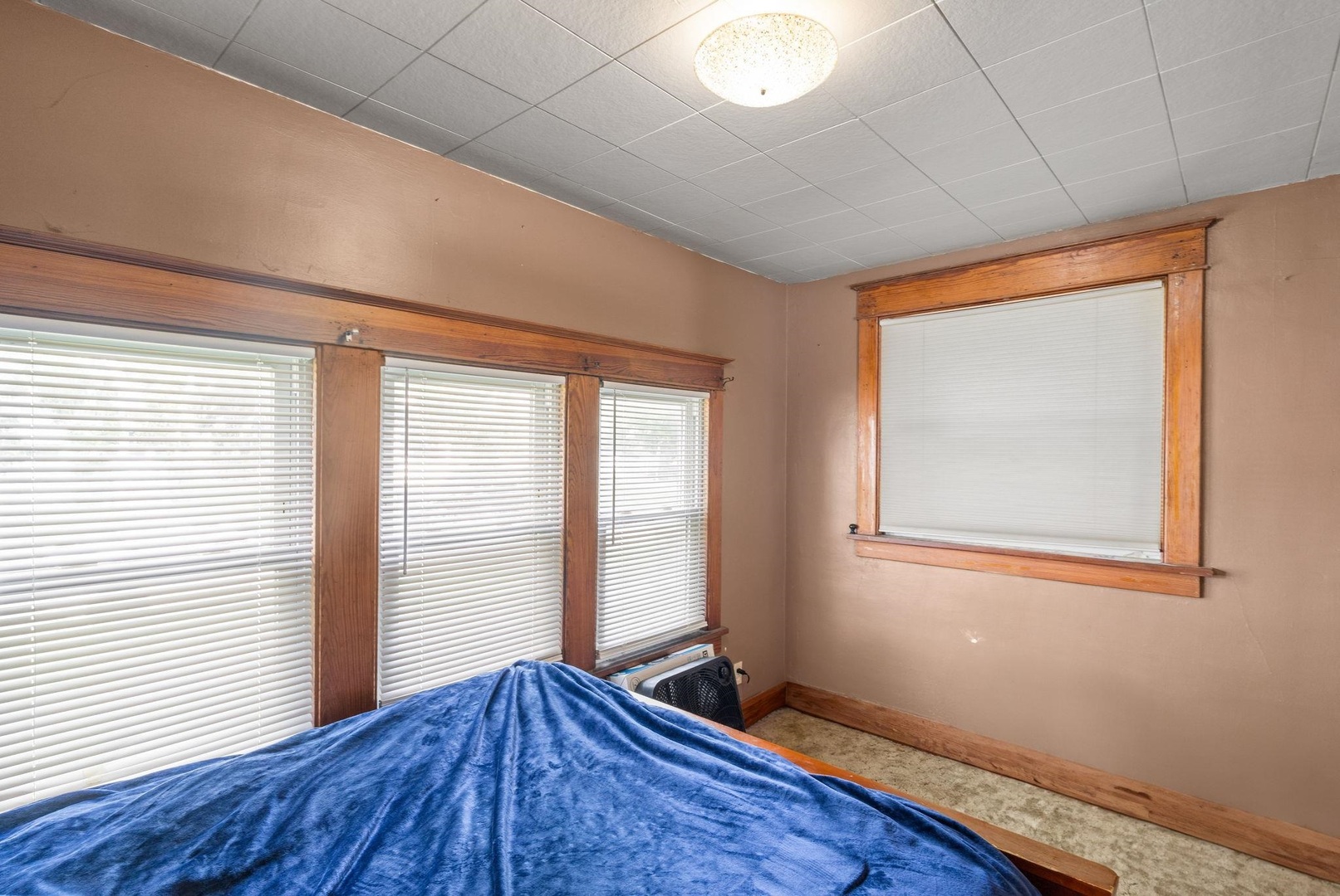 1721 28th Street Rock Island, IL 61201 - Photo 20 of 27 a view of an empty room with wooden floor and a window