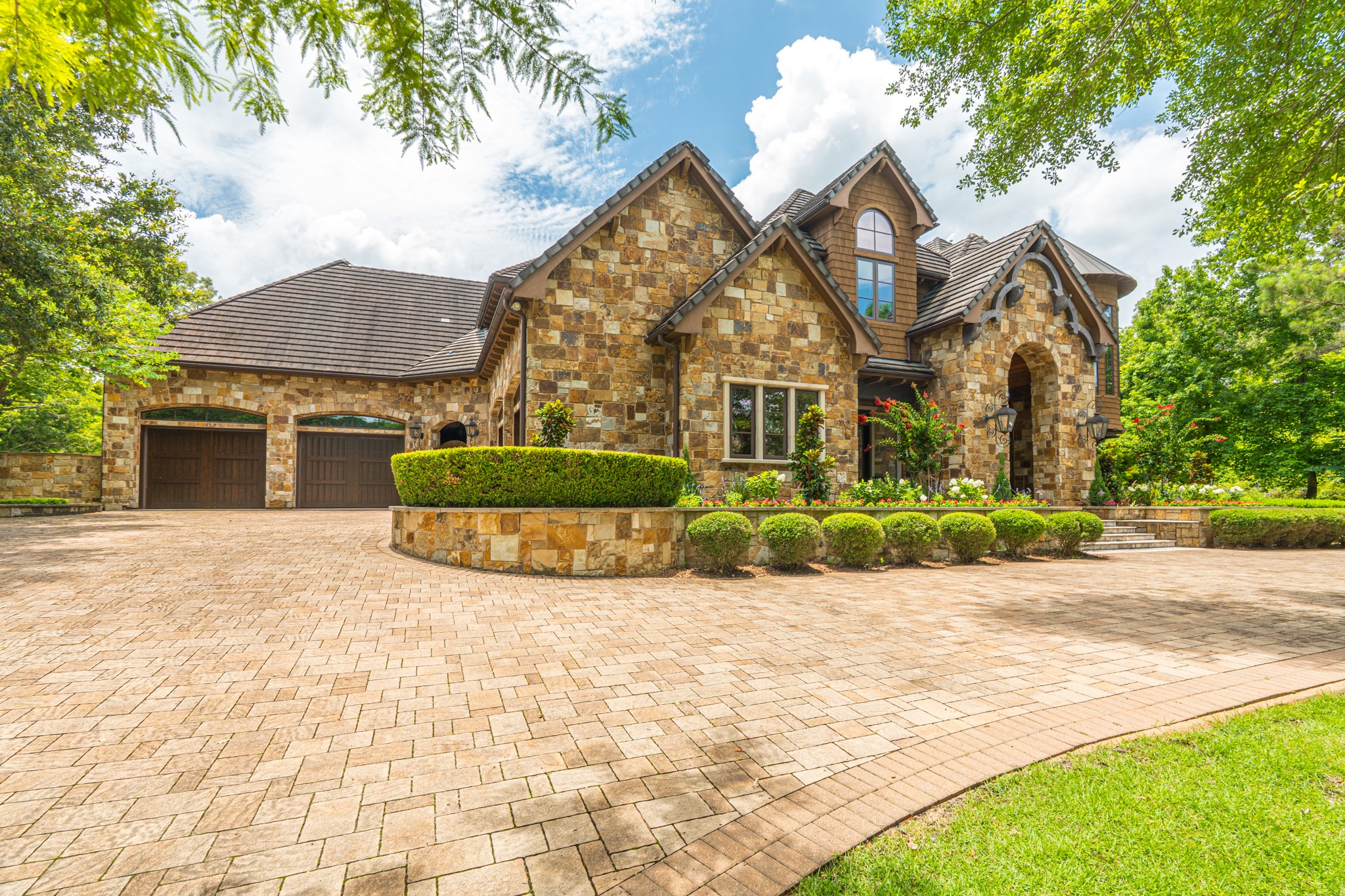 247 South Fazio Way Spring, TX 77389 - Photo 8 of 17 Grand in scale yet warm in design, this stunning estate blends timeless craftsmanship, tranquility, and sophistication in the sought-after community of Carlton Woods.