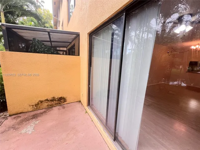 a view of a house with a street