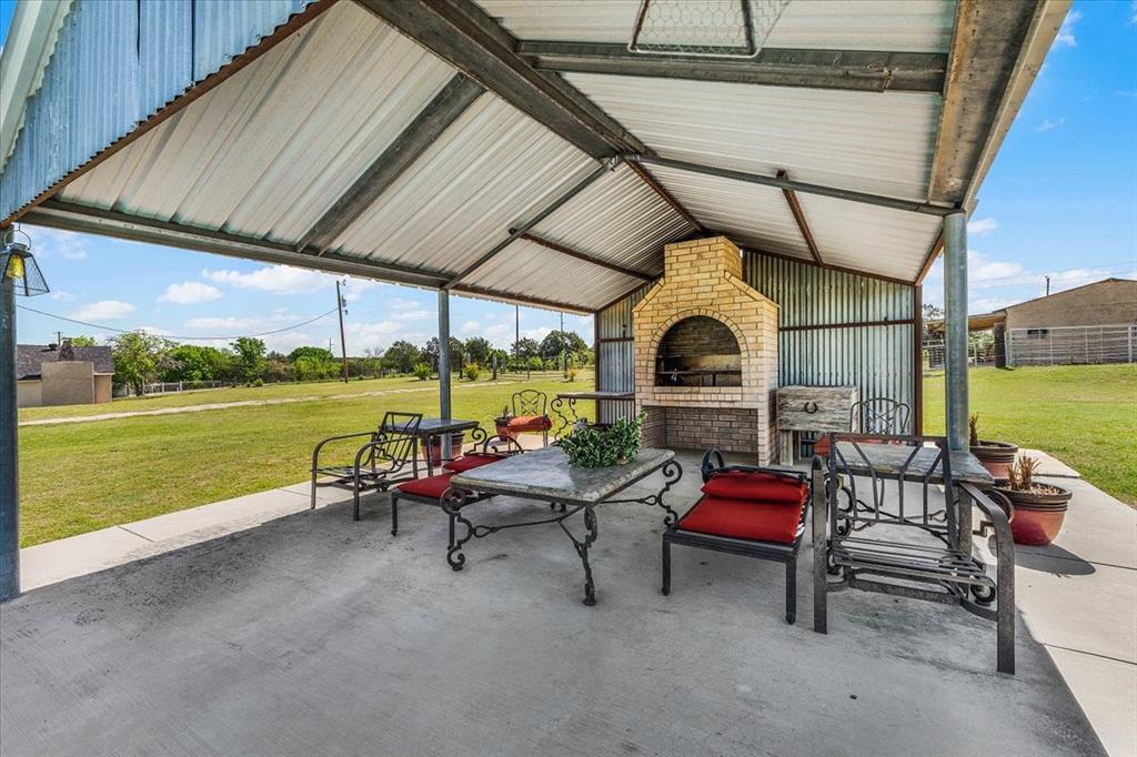748 Rocky Ridge Lane Weatherford, TX 76085 - Photo 5 of 38 a view of sitting area in balcony with furniture