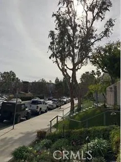 a view of parked cars park