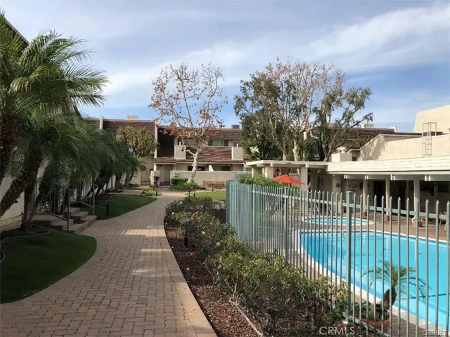 an outdoor space with seating area and furniture