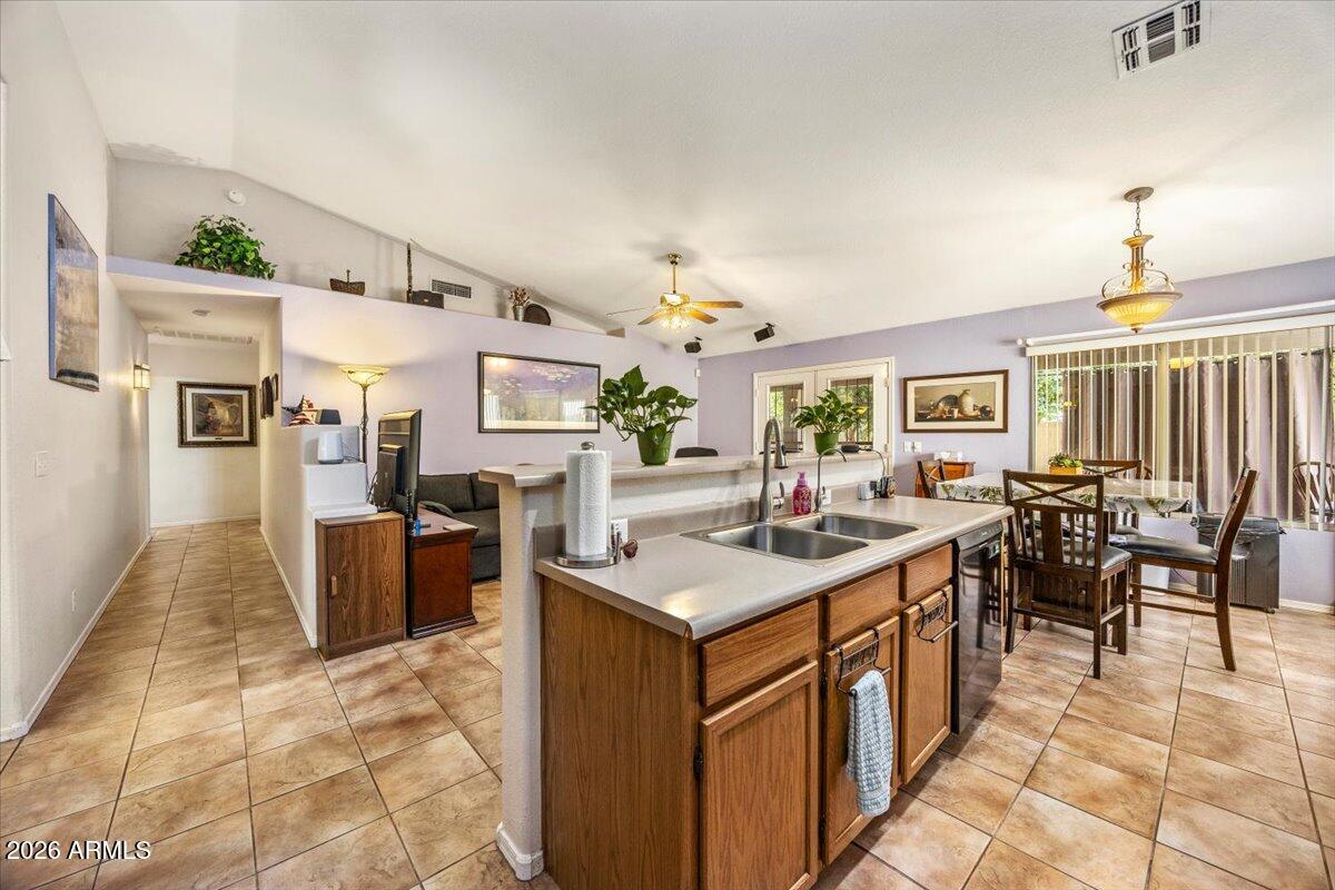 49 West Ivanhoe Street Gilbert, AZ 85233 - Photo 13 of 54 a view of a living room and kitchen
