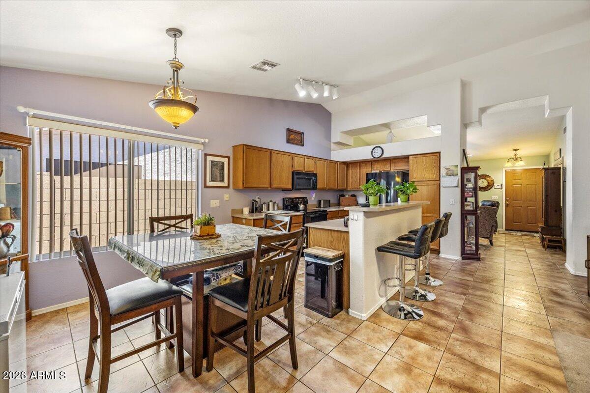 49 West Ivanhoe Street Gilbert, AZ 85233 - Photo 18 of 54 a view of a dining area with furniture