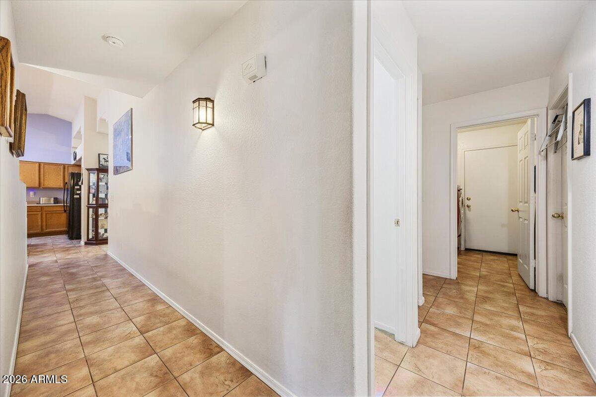 49 West Ivanhoe Street Gilbert, AZ 85233 - Photo 25 of 54 a view of a hallway with a dining area