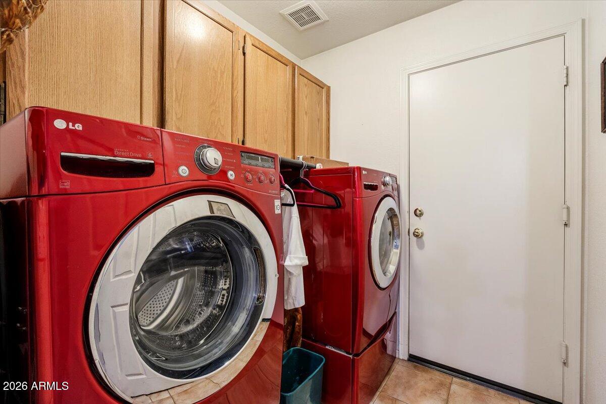 49 West Ivanhoe Street Gilbert, AZ 85233 - Photo 27 of 54 a utility room with dryer and washer