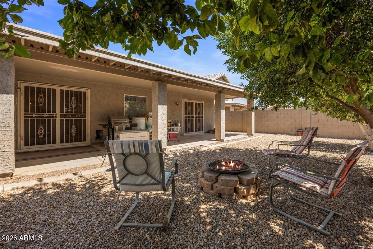 49 West Ivanhoe Street Gilbert, AZ 85233 - Photo 31 of 54 a view of a house with backyard