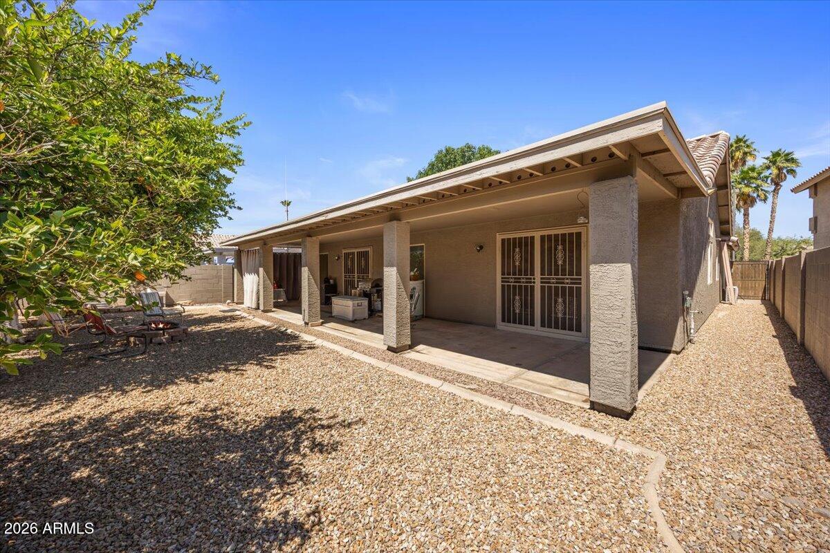 49 West Ivanhoe Street Gilbert, AZ 85233 - Photo 33 of 54 a front view of a house with a yard