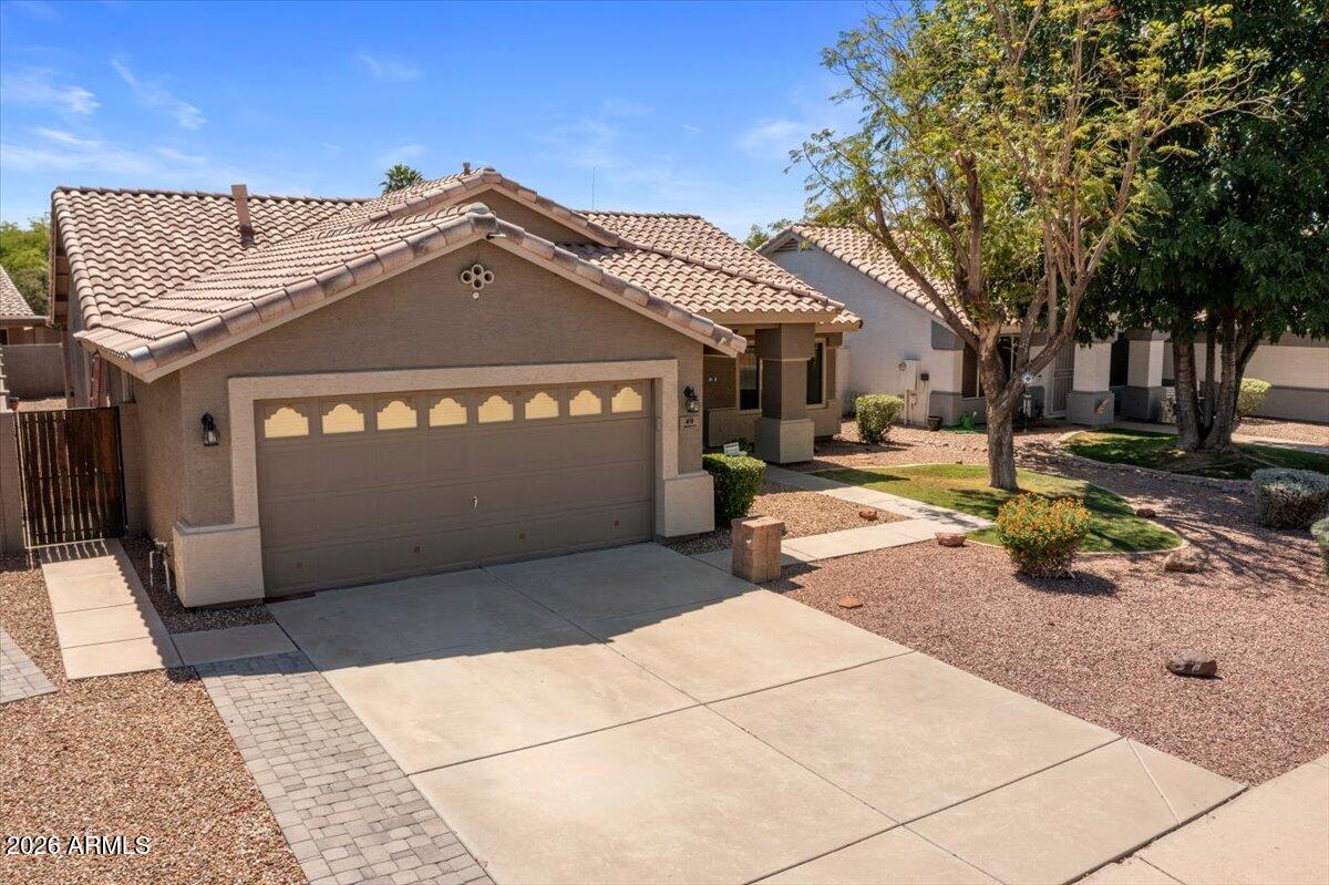 49 West Ivanhoe Street Gilbert, AZ 85233 - Photo 36 of 54 a view of a street with a building in the background