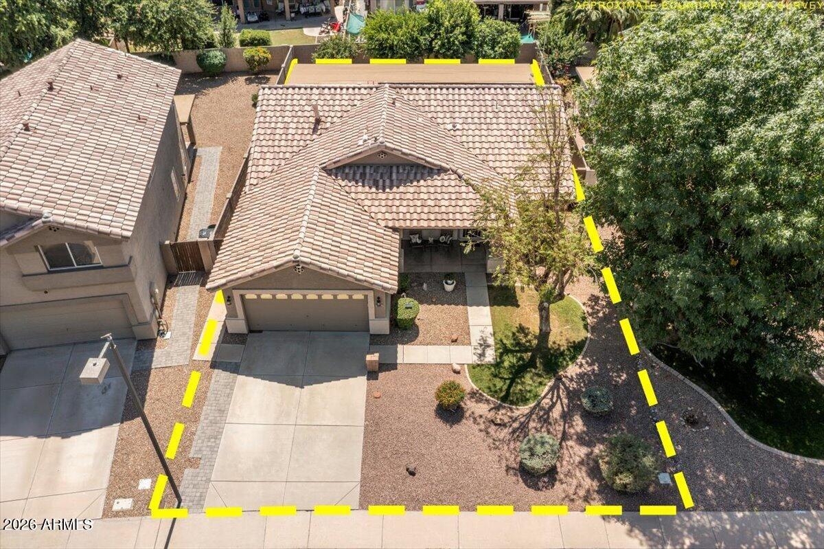 49 West Ivanhoe Street Gilbert, AZ 85233 - Photo 38 of 54 a front view of a house with a yard