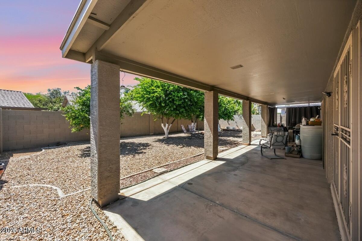 49 West Ivanhoe Street Gilbert, AZ 85233 - Photo 3 of 54 a view of a porch with furniture