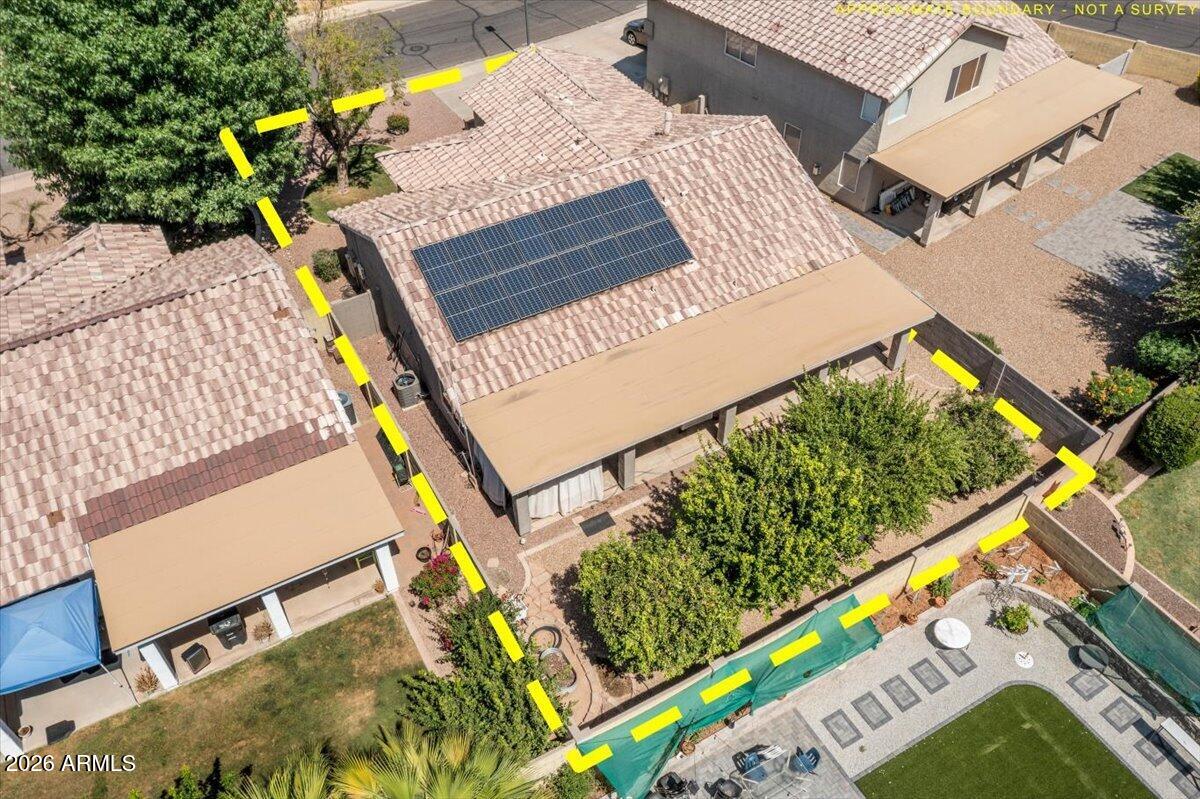 49 West Ivanhoe Street Gilbert, AZ 85233 - Photo 43 of 54 an aerial view of a house with a yard and outdoor seating