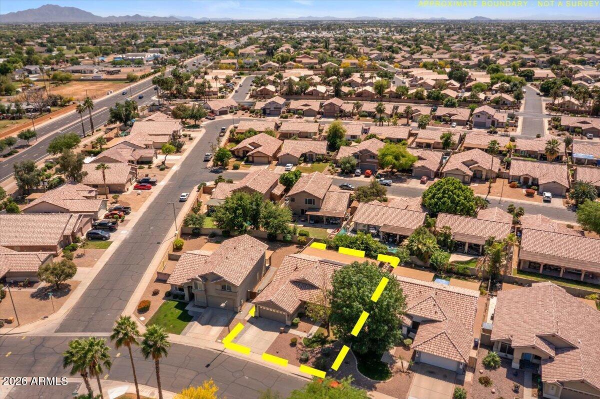 49 West Ivanhoe Street Gilbert, AZ 85233 - Photo 46 of 54 an aerial view of residential houses with outdoor space