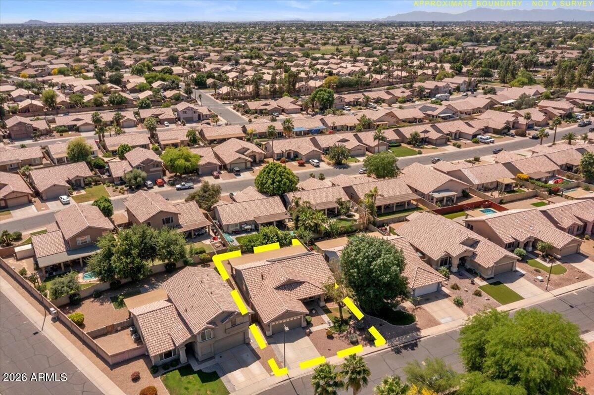 49 West Ivanhoe Street Gilbert, AZ 85233 - Photo 47 of 54 an aerial view of residential houses with outdoor space