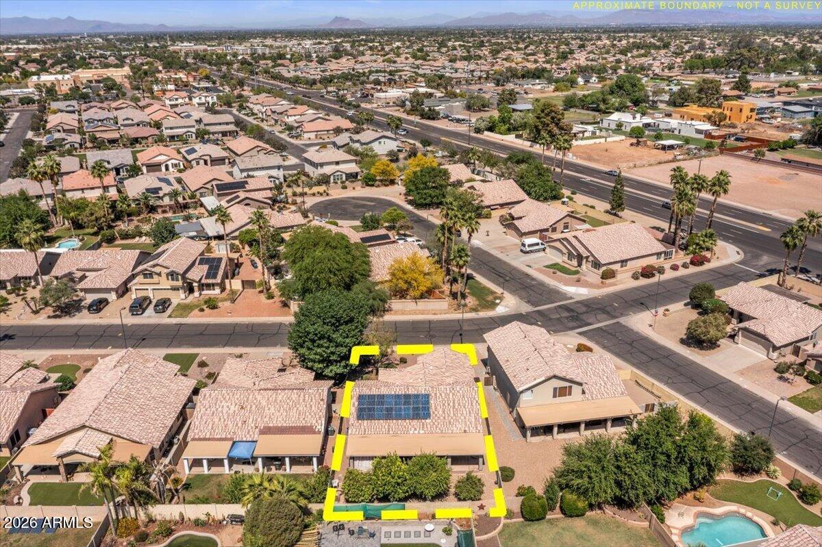 49 West Ivanhoe Street Gilbert, AZ 85233 - Photo 48 of 54 an aerial view of residential houses with outdoor space