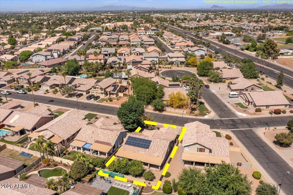 49 West Ivanhoe Street Gilbert, AZ 85233 - Photo 49 of 54 an aerial view of residential houses with outdoor space