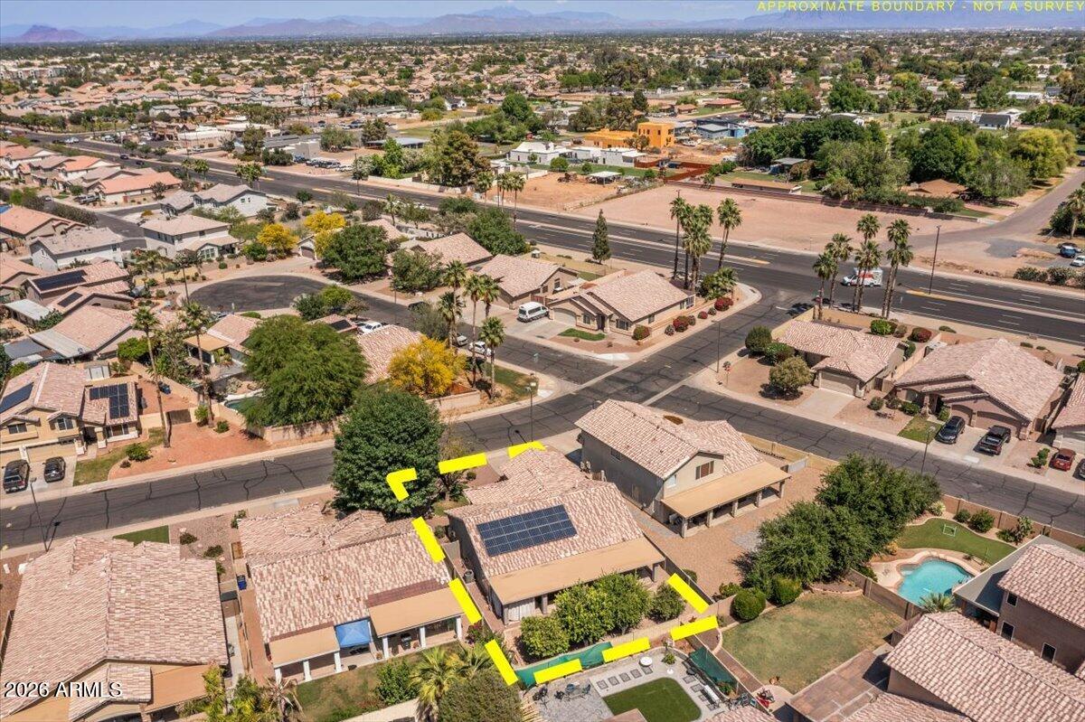 49 West Ivanhoe Street Gilbert, AZ 85233 - Photo 50 of 54 an aerial view of a city with lots of residential buildings