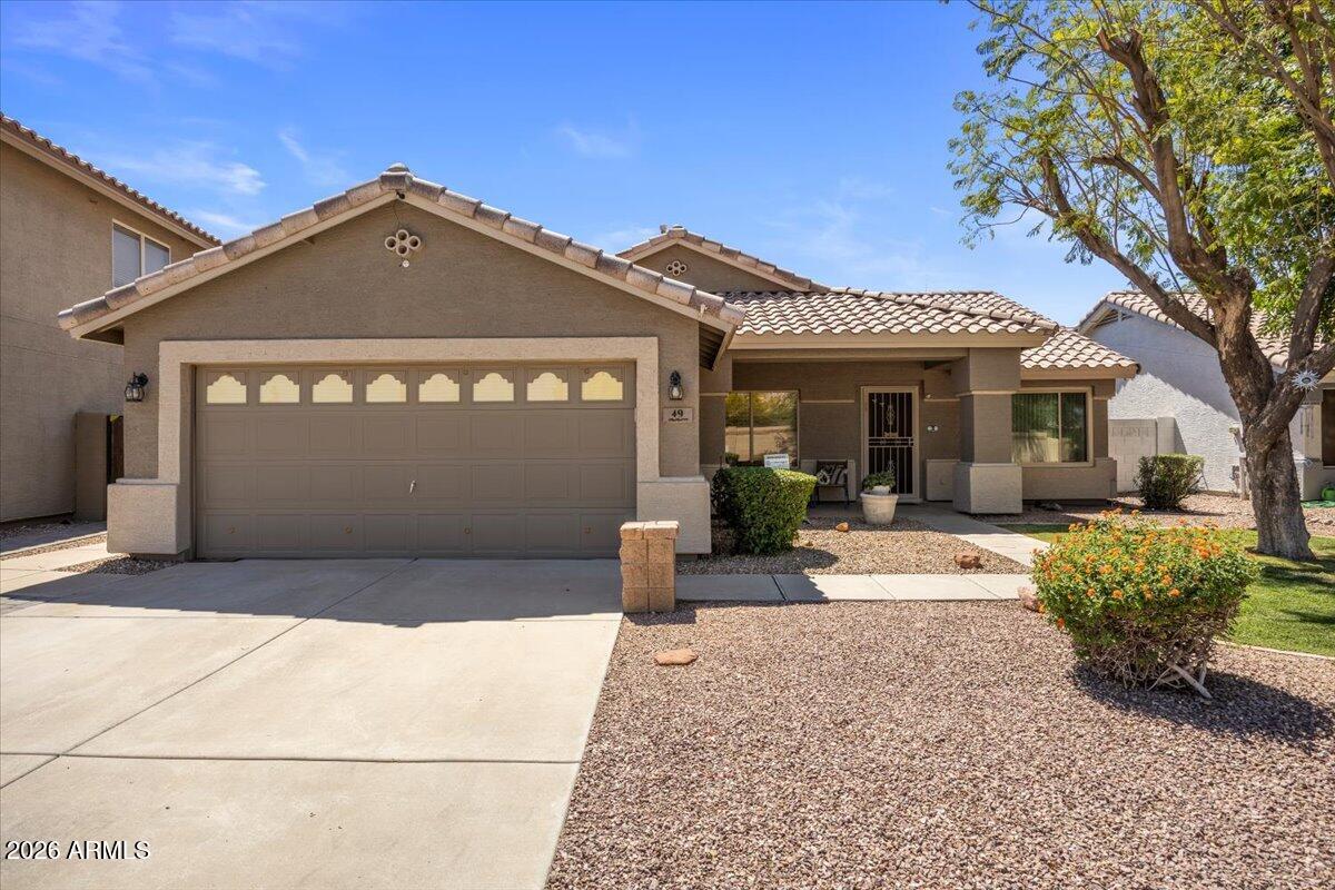 49 West Ivanhoe Street Gilbert, AZ 85233 - Photo 5 of 54 a view of a house with a yard
