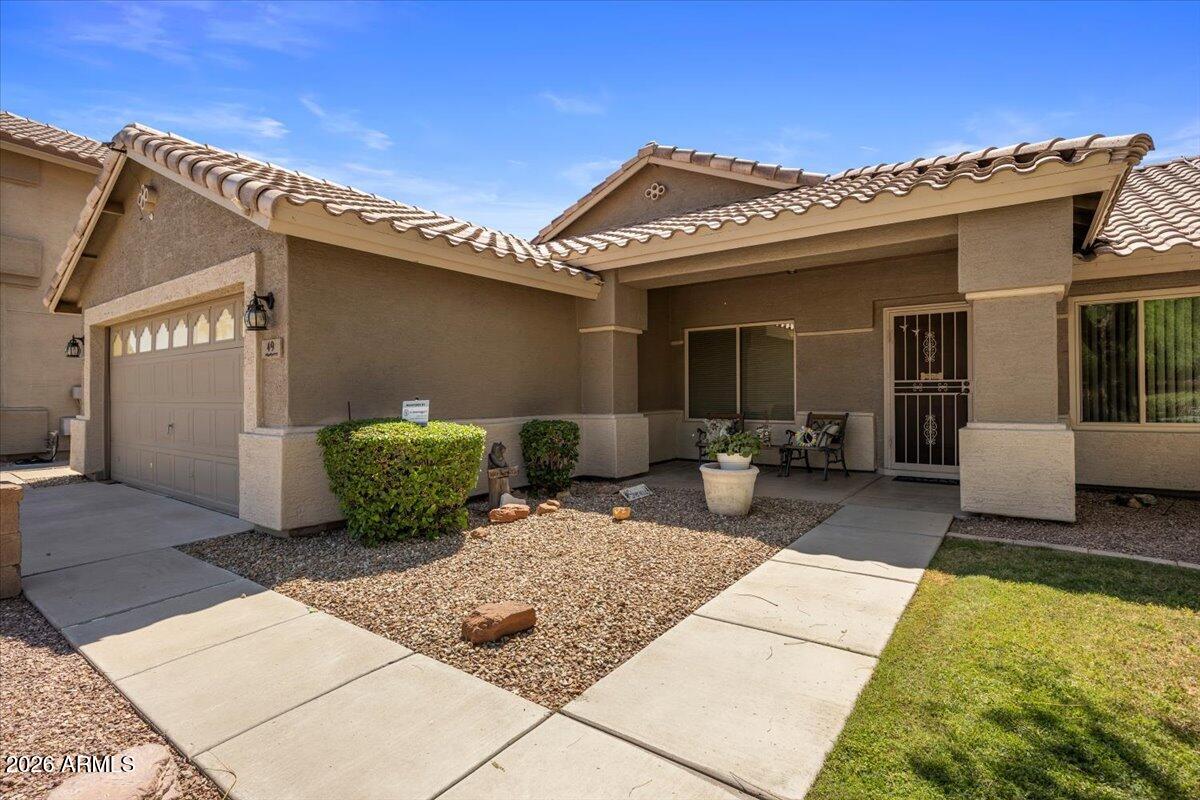 49 West Ivanhoe Street Gilbert, AZ 85233 - Photo 7 of 54 a view of a house with patio