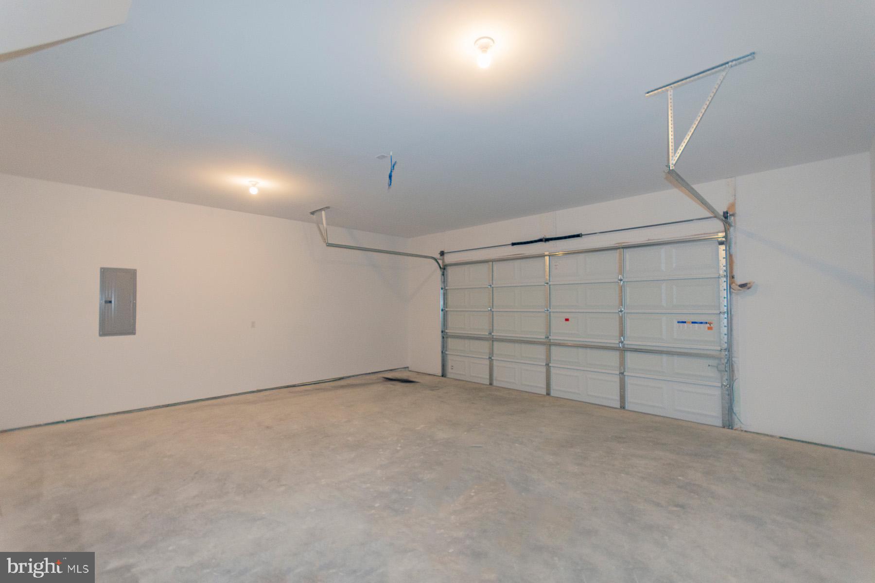 85 Glenaire Road Bunker Hill, WV 25413 - Photo 60 of 68 a view of an empty garage