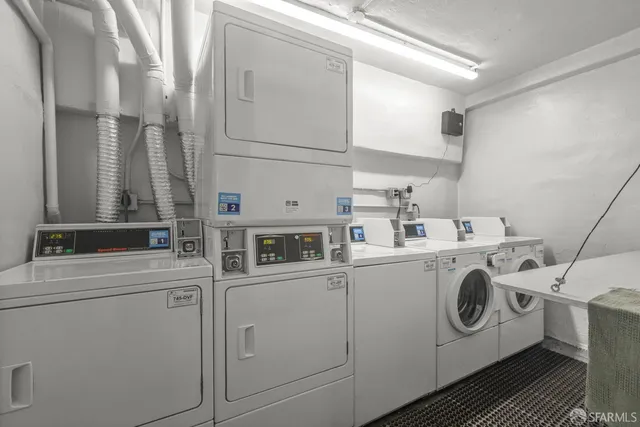 a utility room with dryer and washer