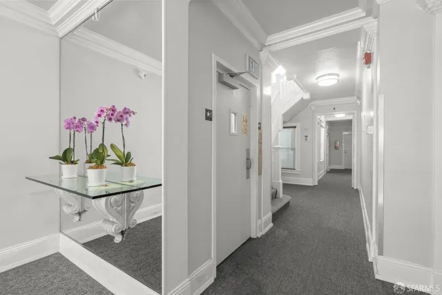 a front view of a building with street view