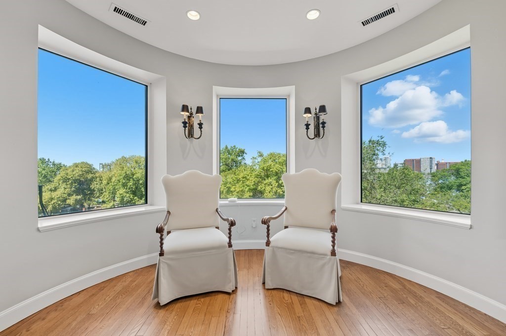 412 Beacon Street, Unit 6 Boston, MA 02115 - Photo 3 of 16 a living room with furniture and a window