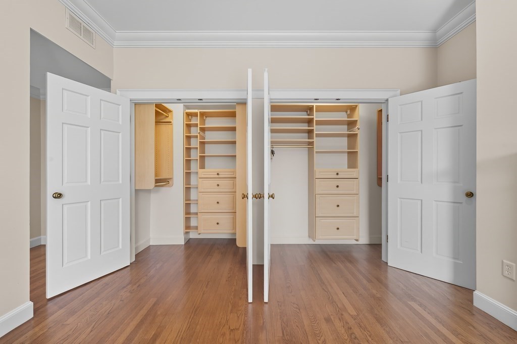 412 Beacon Street, Unit 6 Boston, MA 02115 - Photo 10 of 16 wooden floor in an empty room