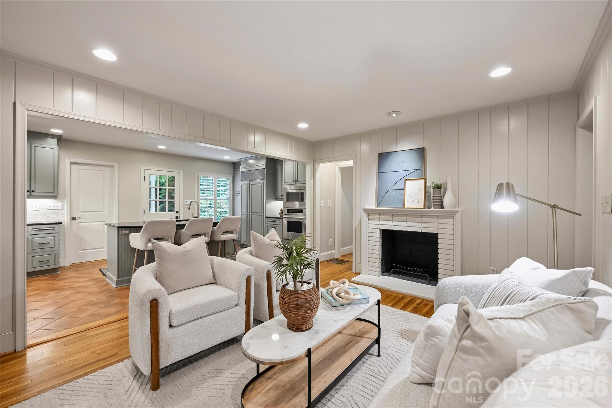 5519 Robinhood Road Charlotte, NC 28211 - Photo 24 of 46 a living room with furniture and a fireplace