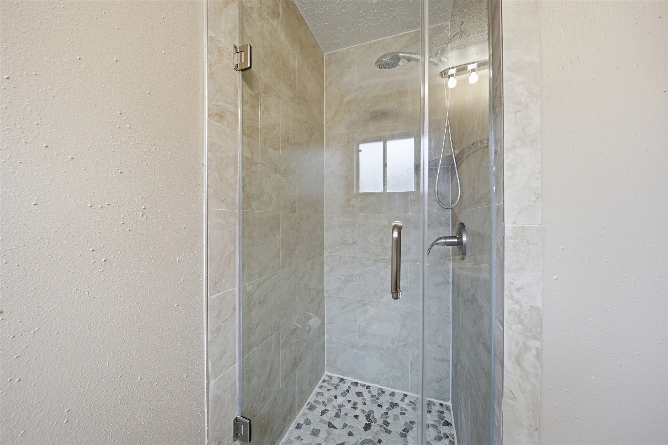 9418 Kilrenny Drive Spring, TX 77379 - Photo 29 of 47 a bathroom with a shower and a sink