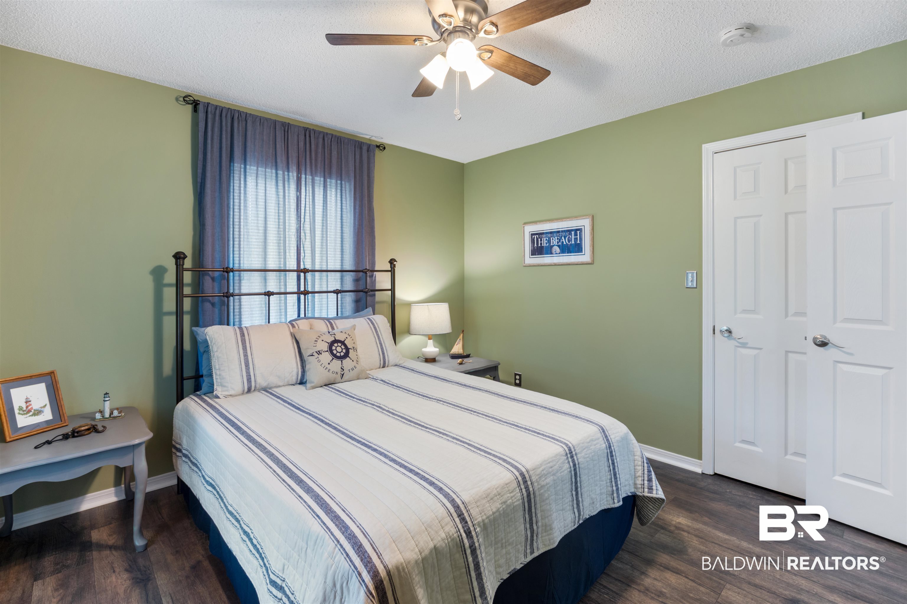 9771 Clarke Ridge Road Foley, AL 36535 - Photo 42 of 72 Bedroom featuring a textured ceiling, baseboards, and ceiling fan.