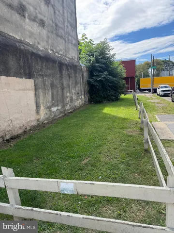 a view of yard with outdoor seating