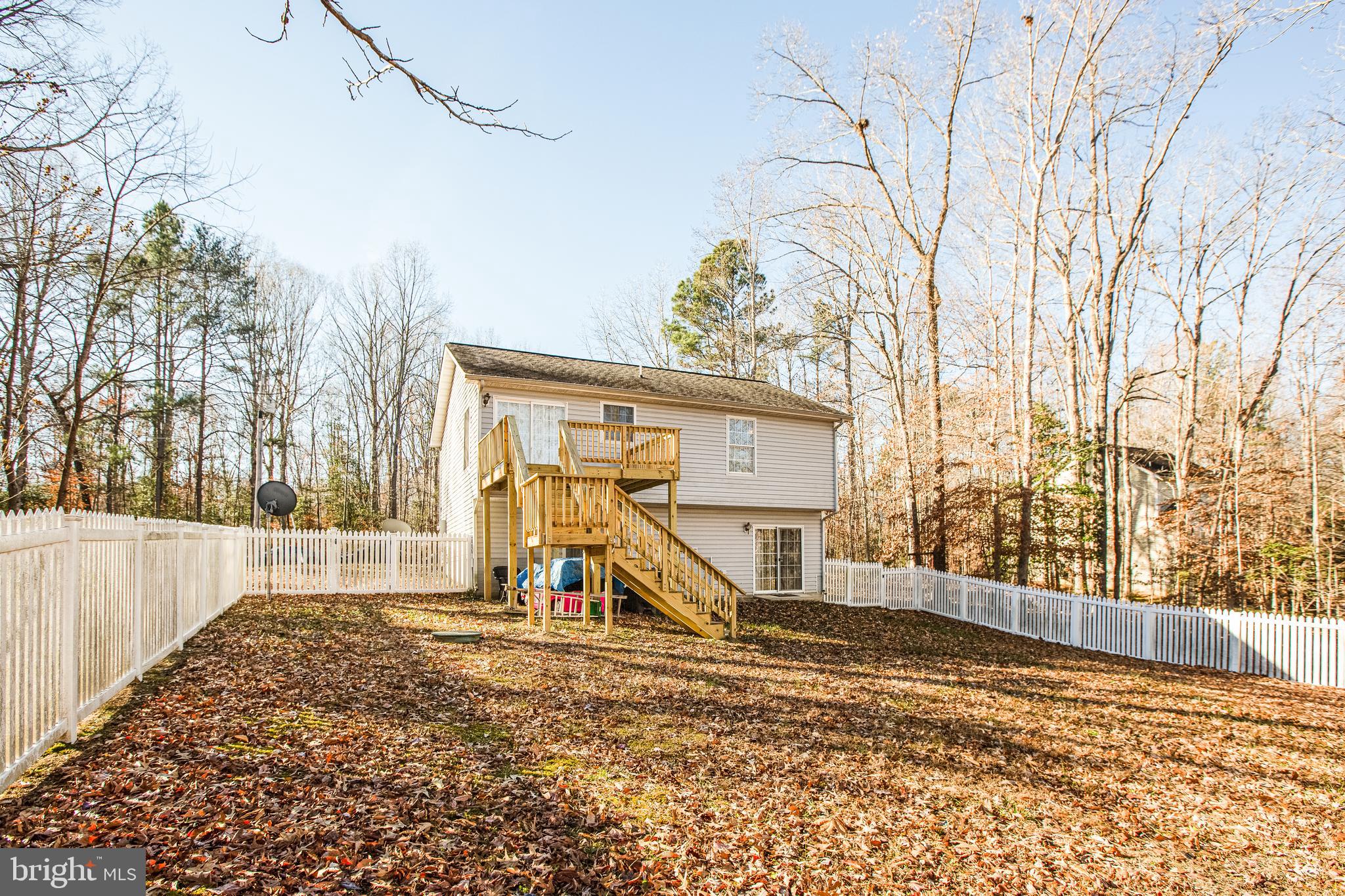 12 Johnson Drive Ruther Glen, VA 22546 - Photo 24 of 33 Spacious fenced-in back yard.