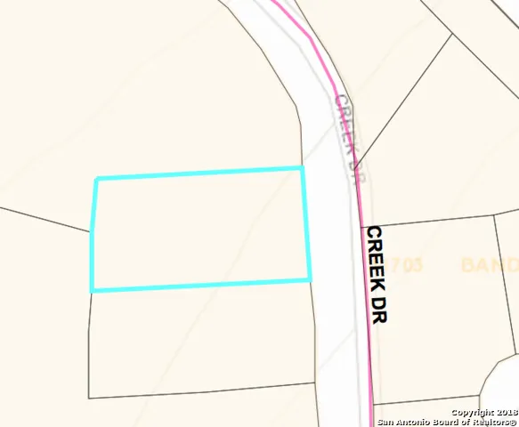 a bathroom with a shower and a glass door