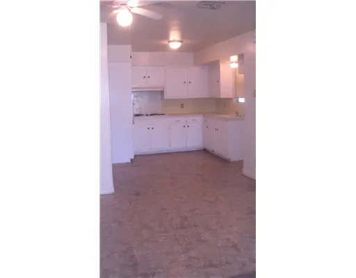 a view of a kitchen with a sink