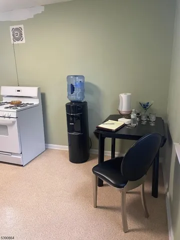 a workspace with furniture and a table