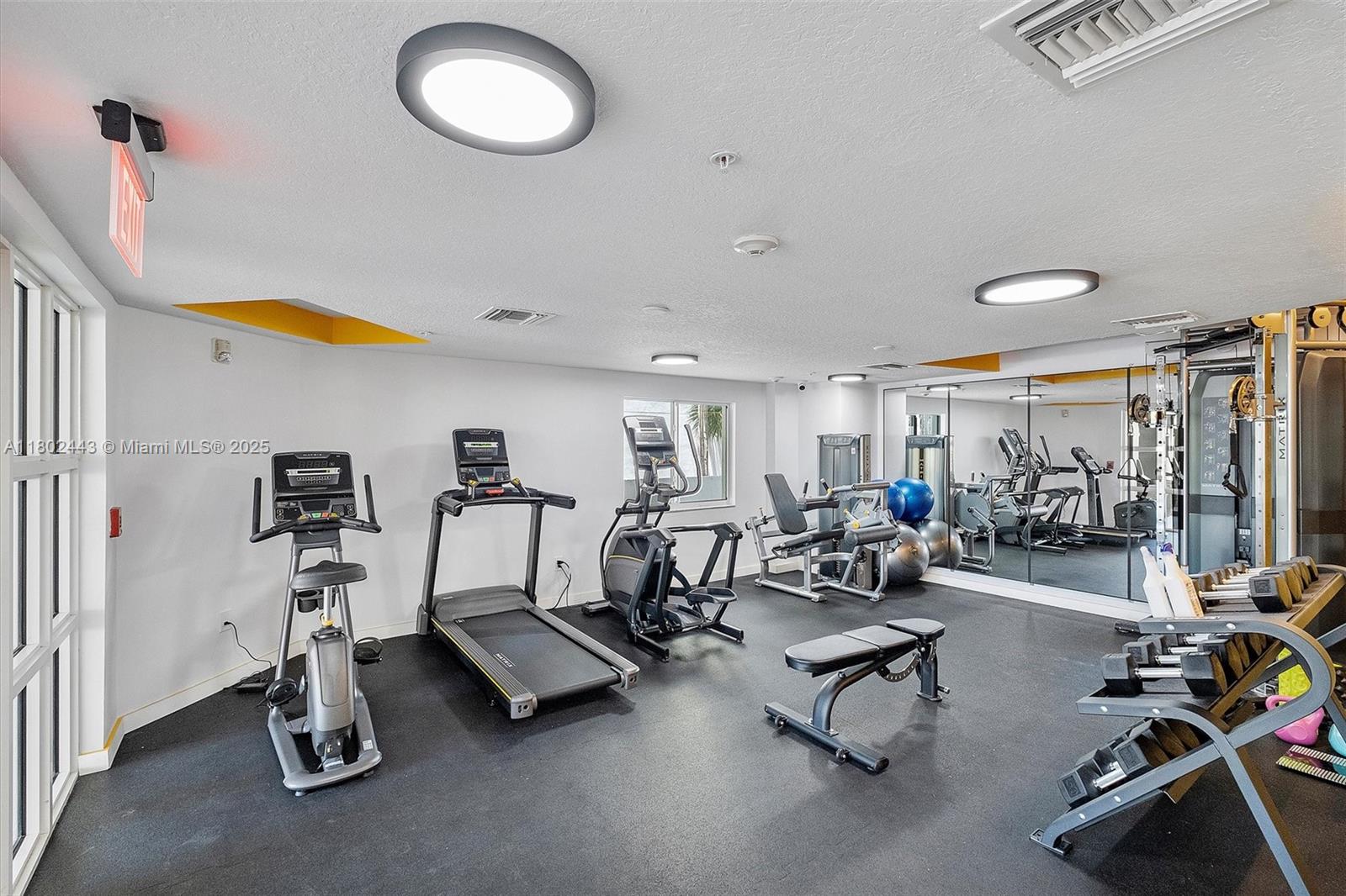 280 Southwest 20th Road, Unit 407 Miami, FL 33129 - Photo 16 of 23 a view of a room with gym equipment