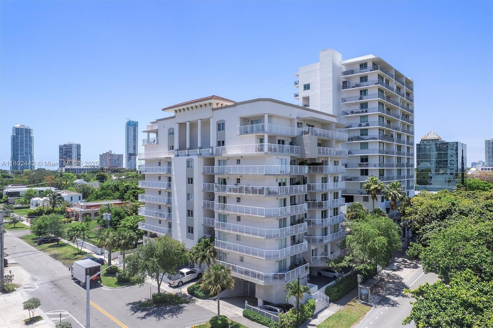 280 Southwest 20th Road, Unit 407 Miami, FL 33129 - Photo 18 of 23 a large building with a small yard