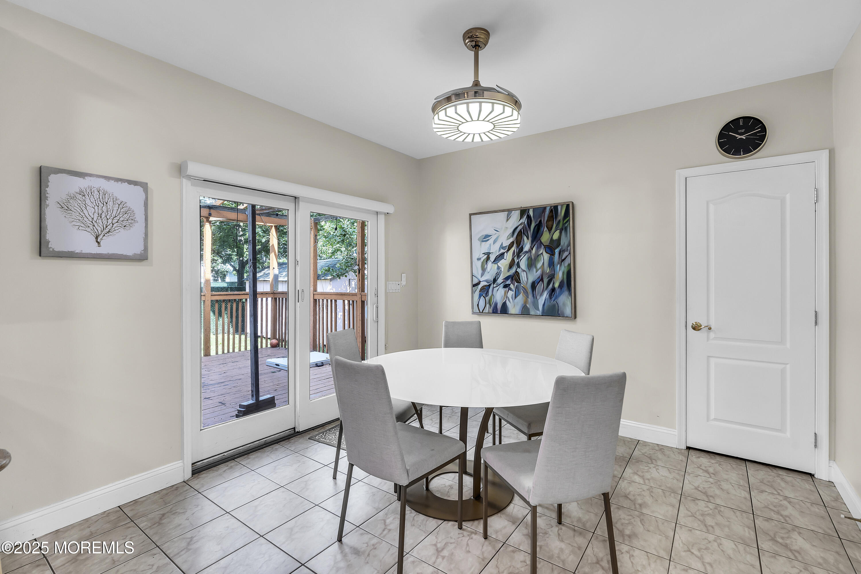100 Case Road Lakewood, NJ 08701 - Photo 13 of 36 a view of a dining room with furniture and chandelier