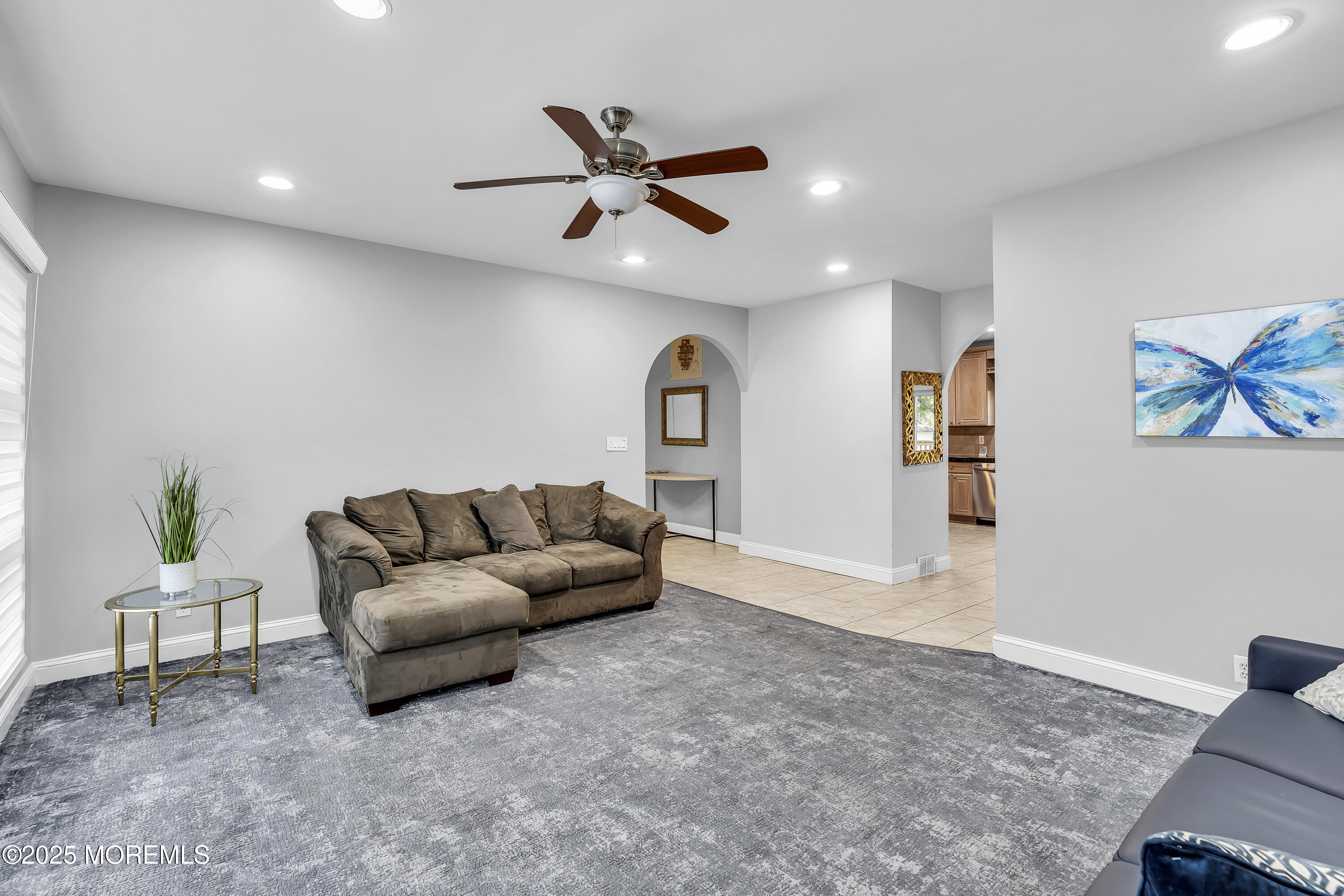 100 Case Road Lakewood, NJ 08701 - Photo 14 of 36 a living room with furniture and a ceiling fan