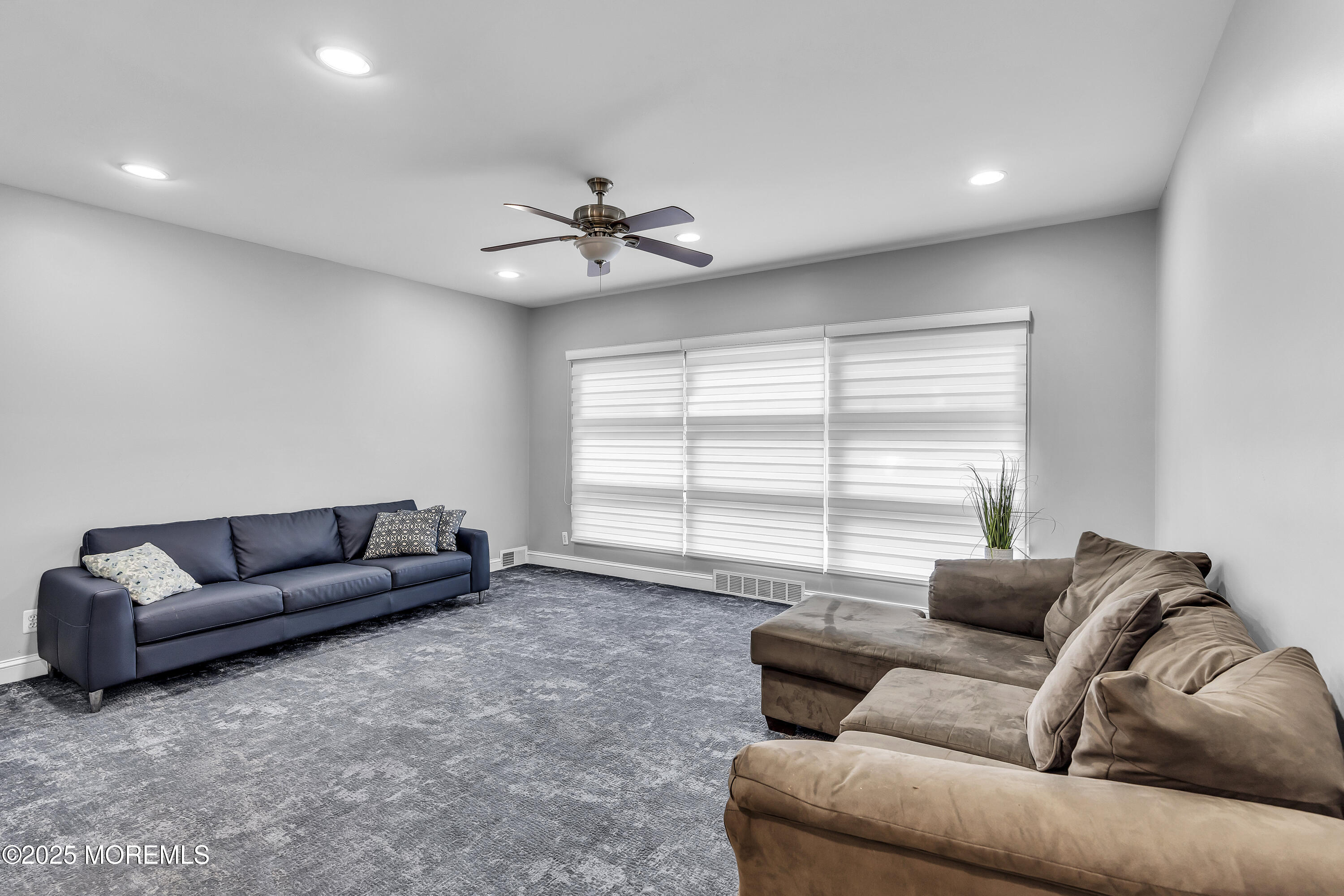 100 Case Road Lakewood, NJ 08701 - Photo 15 of 36 a living room with furniture and a large window